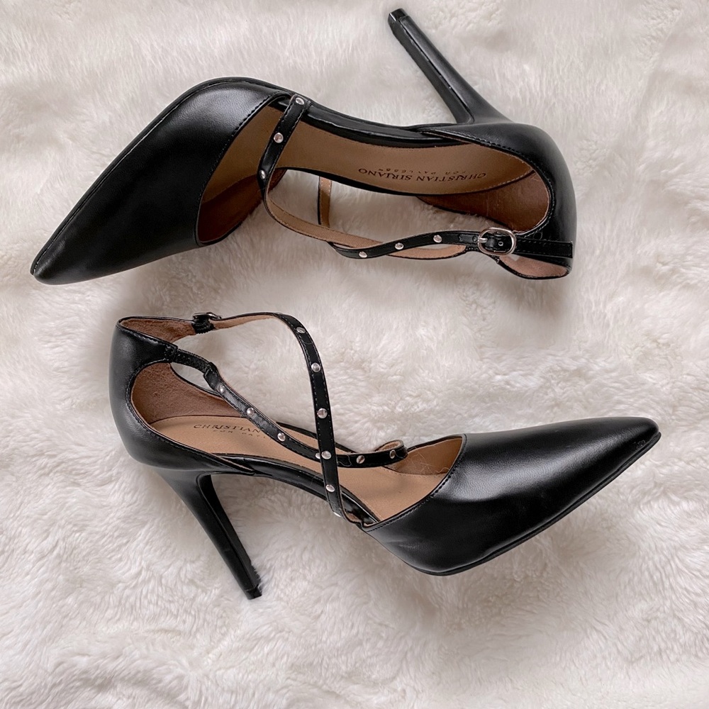 Black pointed toe pumps criss cross